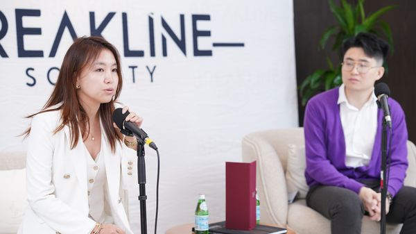 A speaker and Ryan Zhang in conversation at the BreakLine Society Stablecoin and Web3 Founders Forum, October 2025