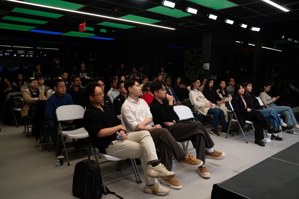 A full room of attendees during the program